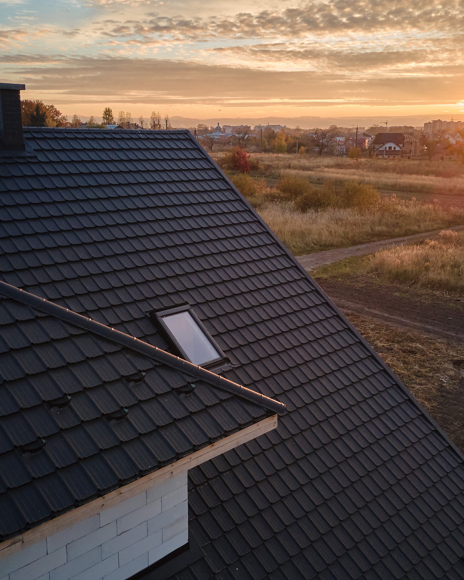 Metal tile roofing system — golden hour